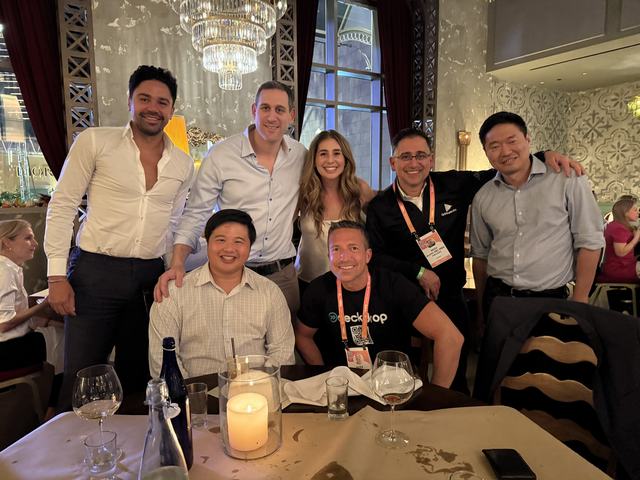 ClinX community dinner with members and faculty gathered around a table