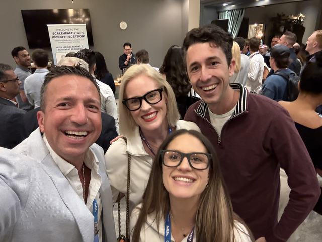 ClinX attendees celebrating and networking at a live event