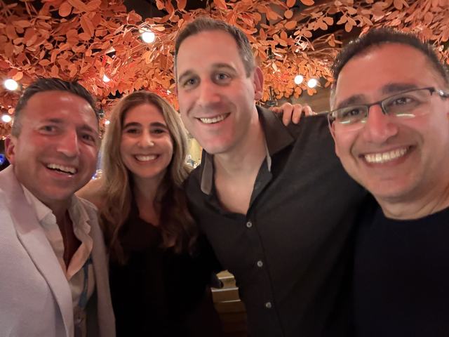 ClinX members standing together during an in-person meetup