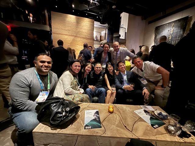 ClinX community members sharing a celebratory group moment